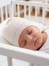 Хлопковая шапочка для новорожденных с завязками фото 11 &mdash; MamaEmma.ru